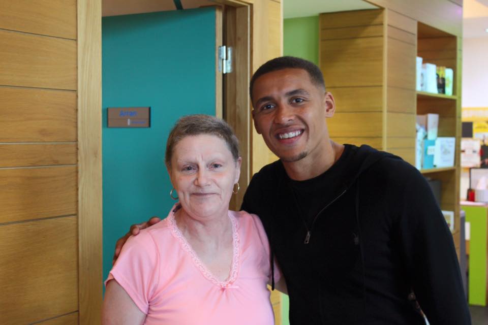 Rangers Captain James Tavernier meets a patient at the Beatson 