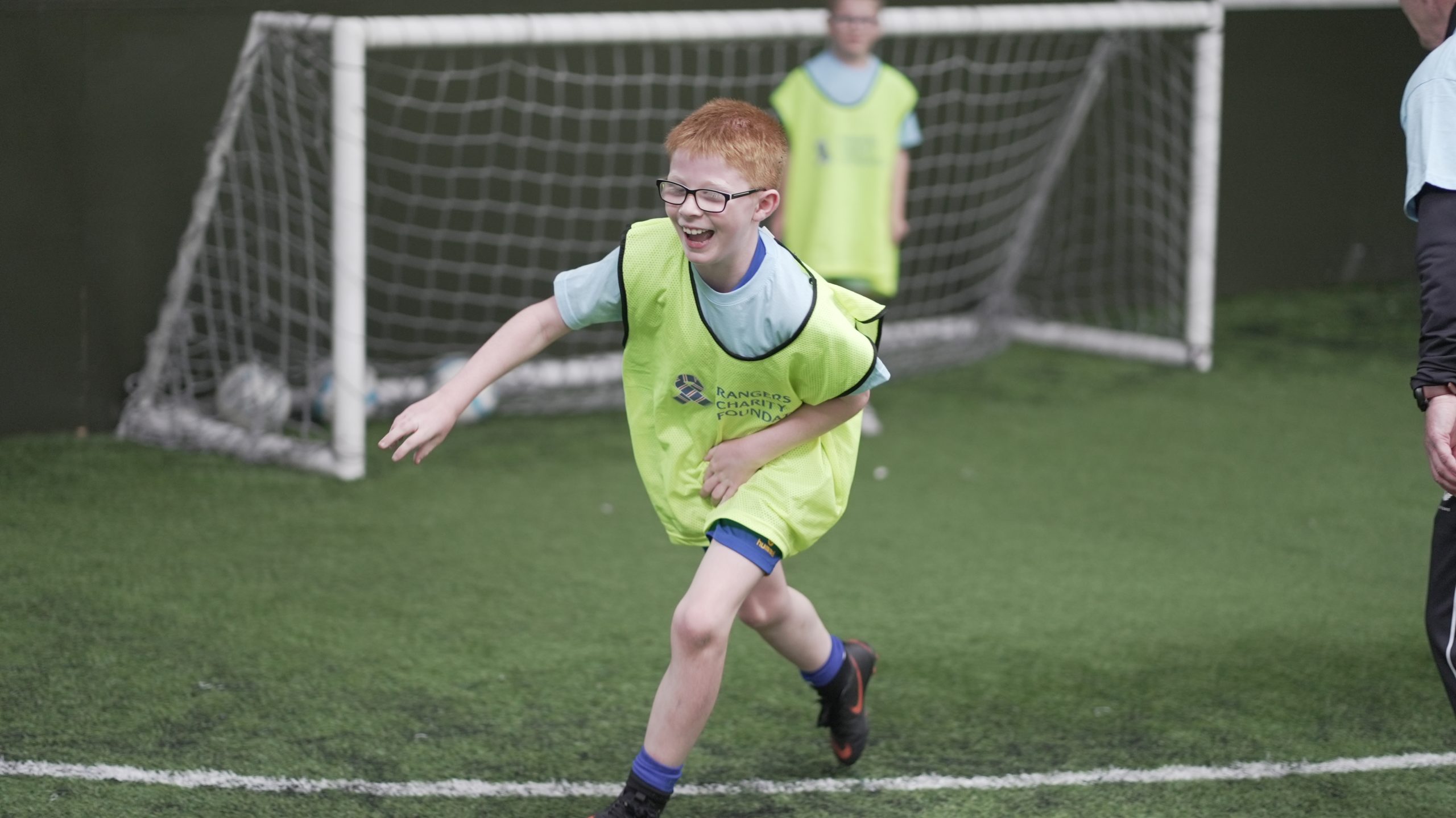 Visually Impaired child playing football