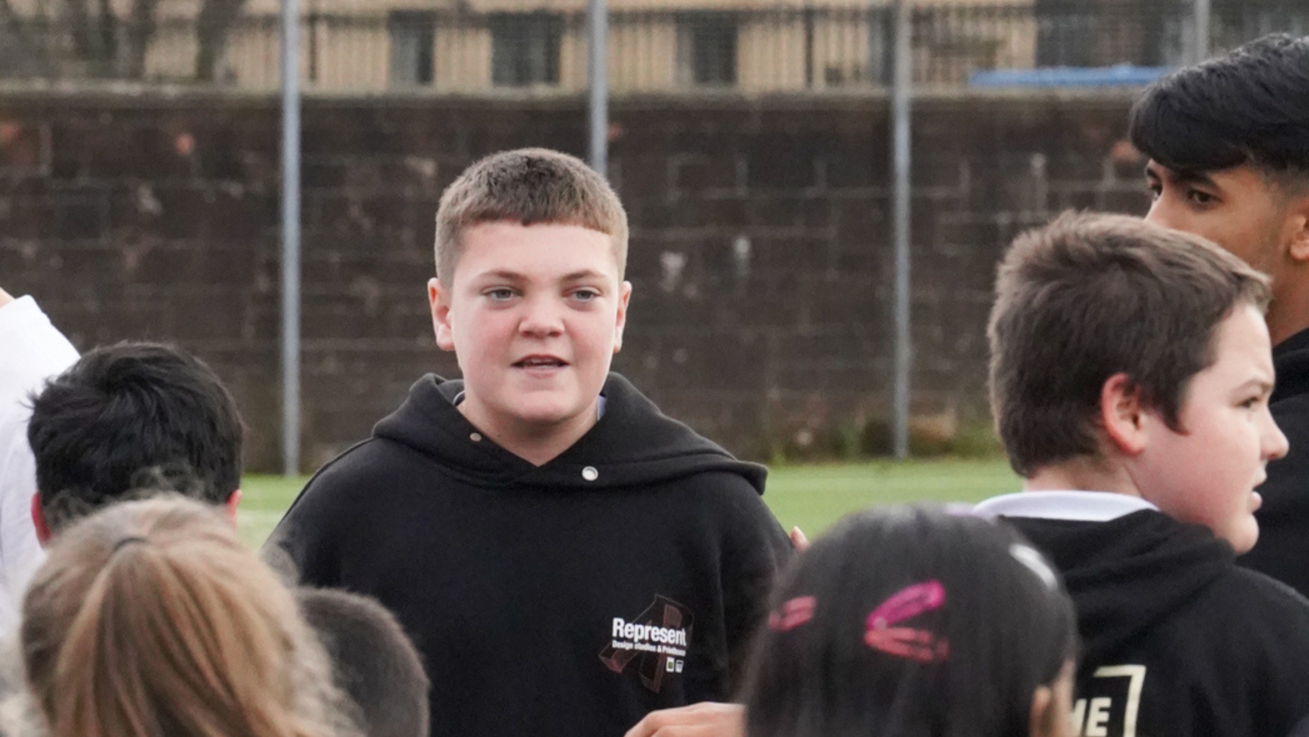 A Wider Achievement participant delivering a PE session to primary school children