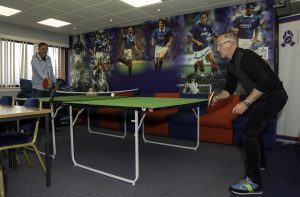 Programme participants play table tennis in the Ibrox Community Hub