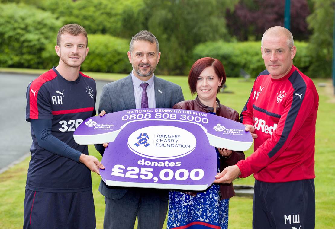 Mark Warburton, Andy Halliday , Connal Cochrane and 1 lady holding Prop cheque with amount donated