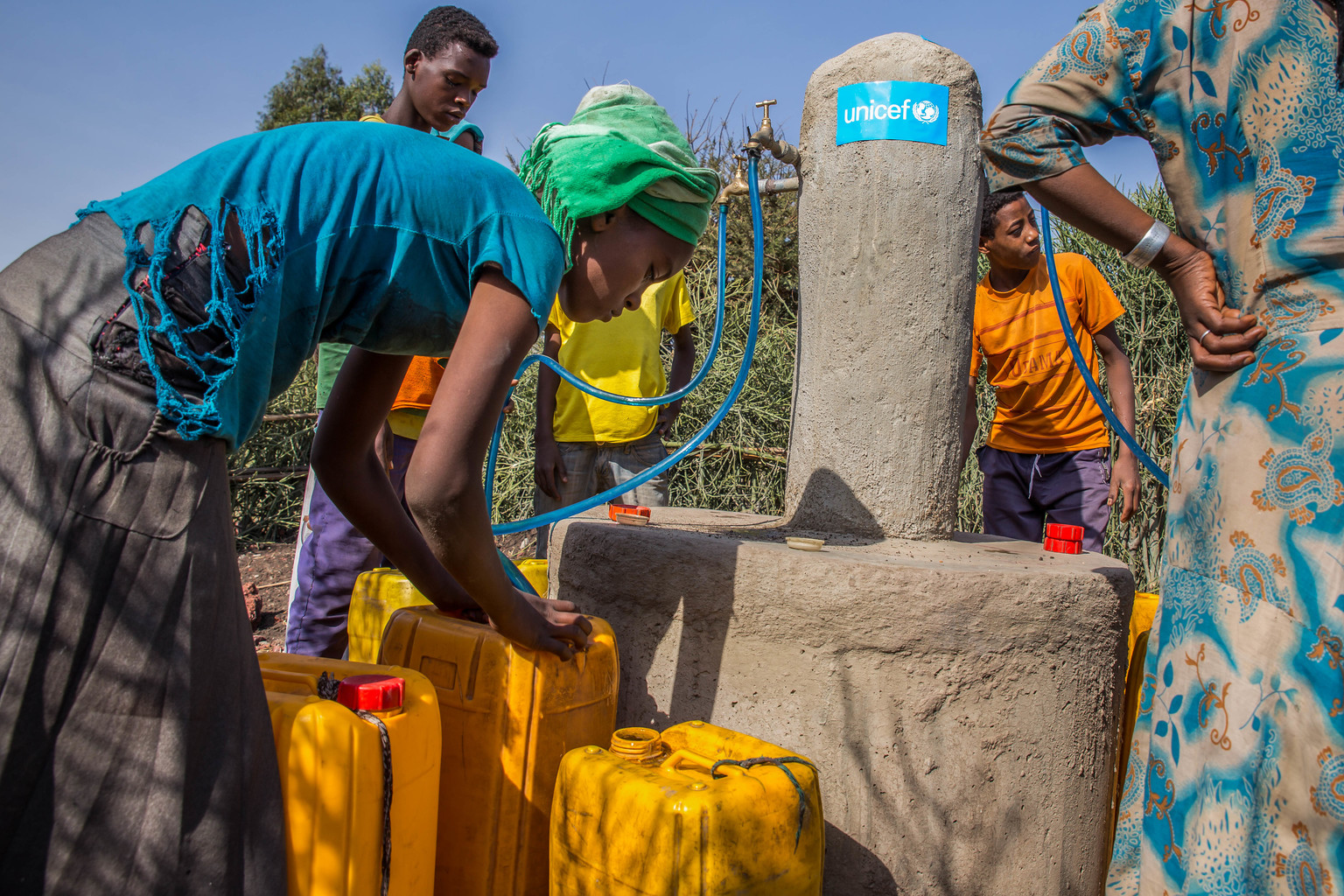 Lady collecting water in Ethiopa