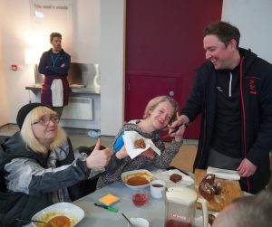 Foundation staff serve lunch at Glasgow City Mission