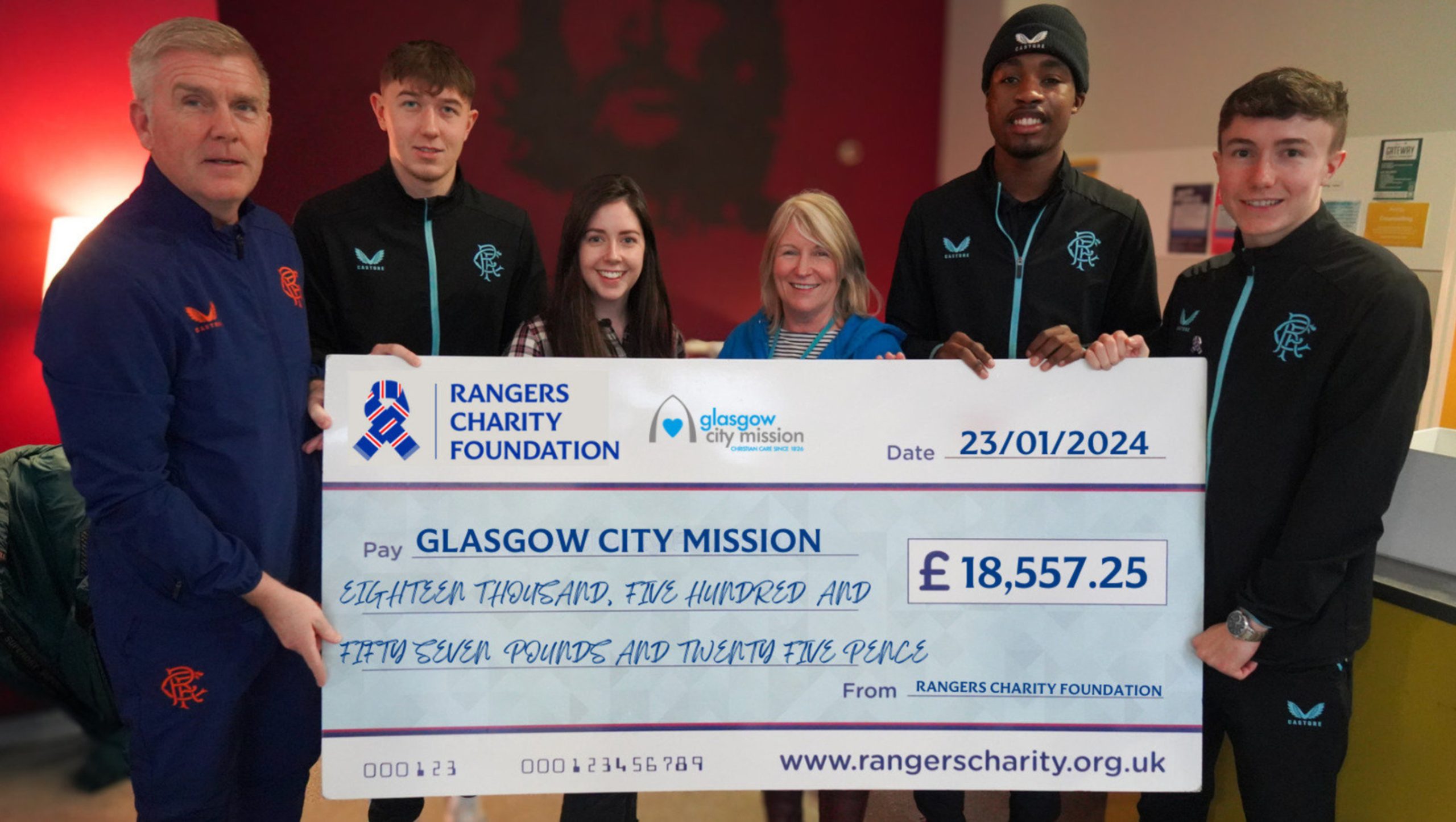 academy players with cheque