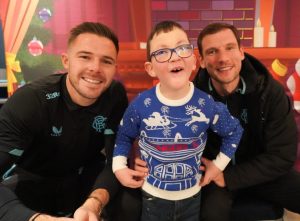 young boy with Xmas jumper with Butland and Barasic