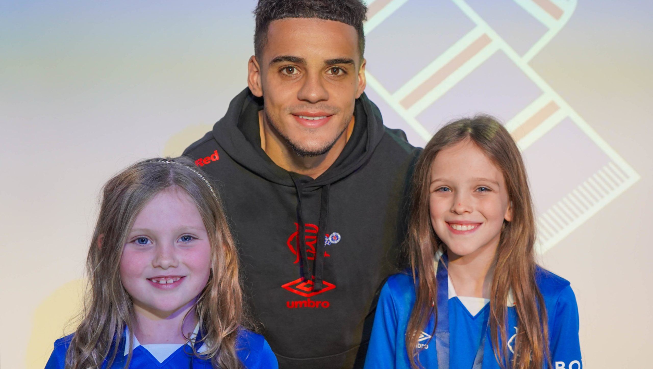 max aarons and two young fans