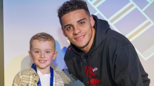 max aarons and a young fan