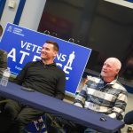 Barry Ferguson, Lee McCulloch, John Brown and Ian Durrant, sitting at a table talking to a group of Veterans.