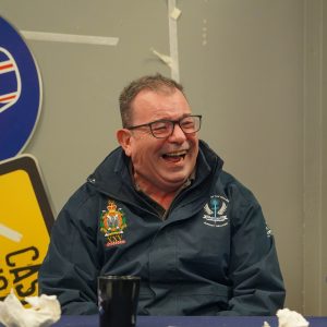 A veterans having a laugh while having a conversation.