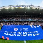 armed forces day banner on the pitch at Ibrox