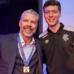 man with medal with rangers player