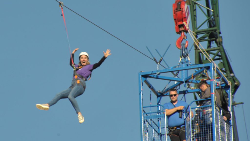 person on a zipslide
