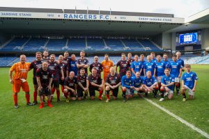 play on the pitch teams at Ibrox