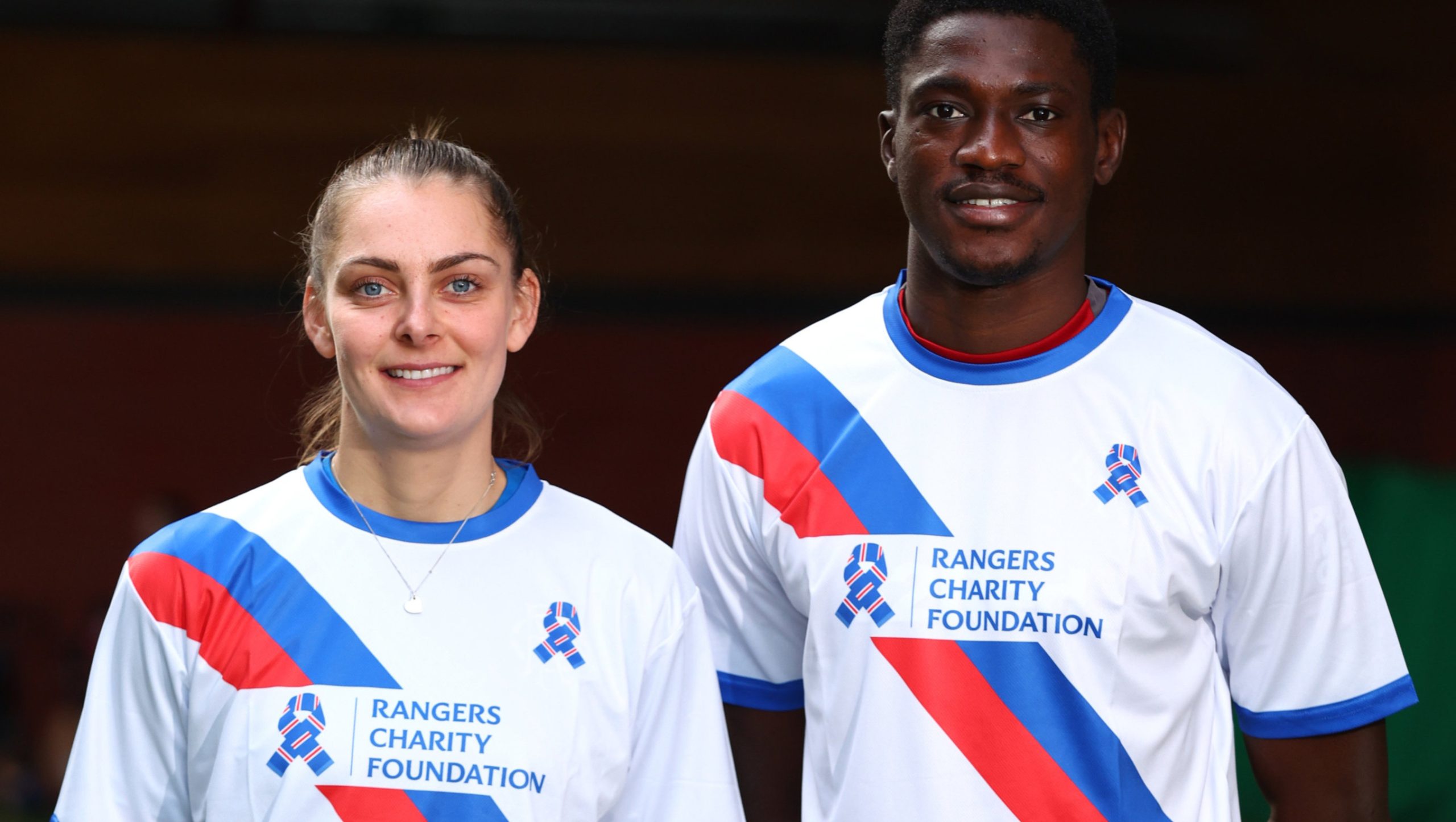 players wearing foundation running tops