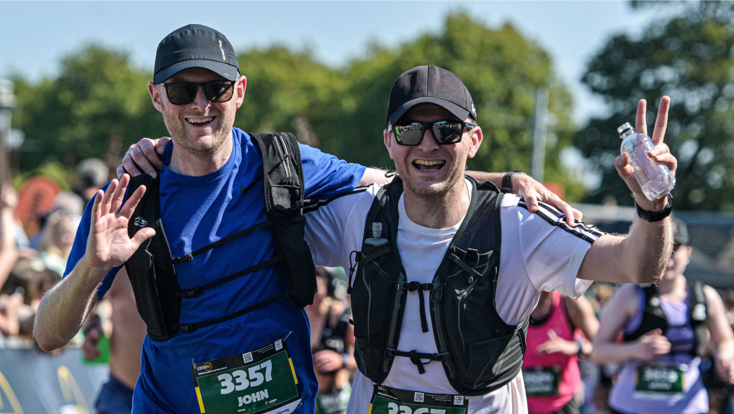 2 men celebrating at the finish line