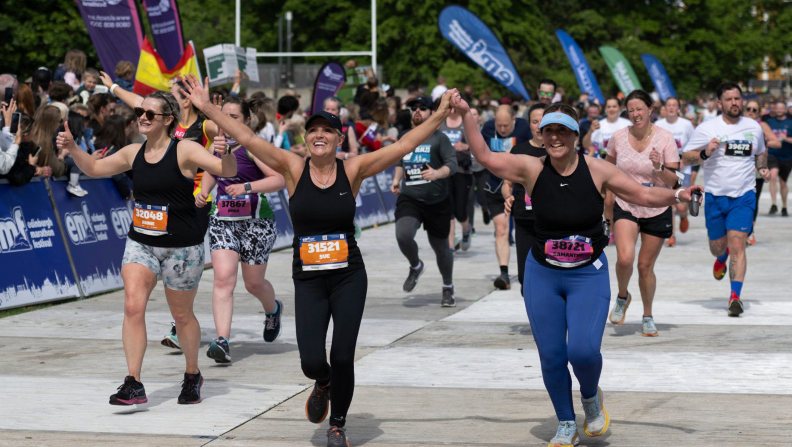 runners crossing the finish line